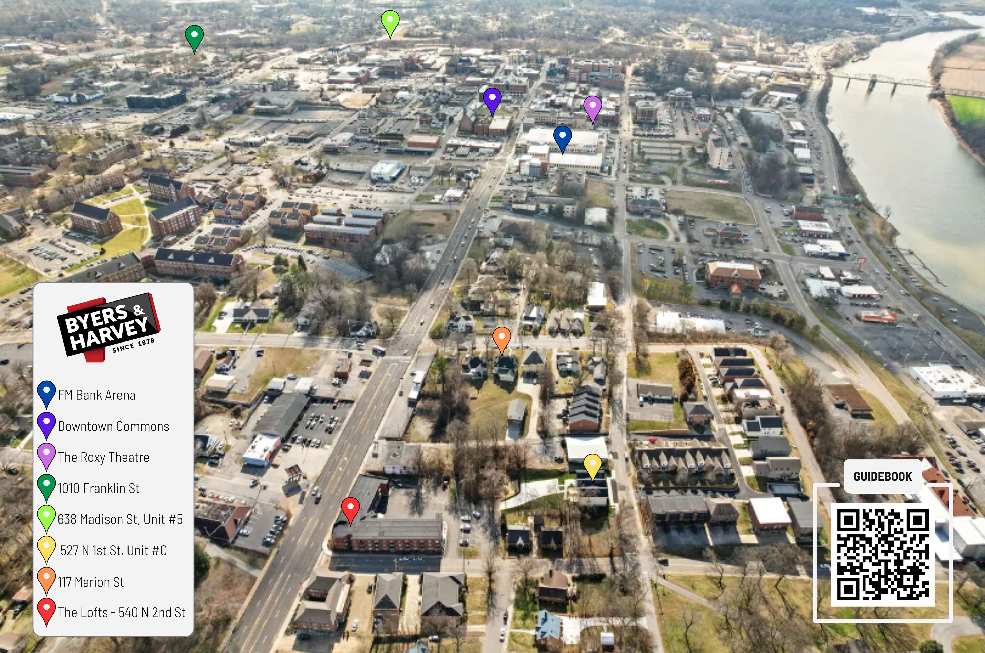 An aerial view of a city with various landmarks and streets marked.
