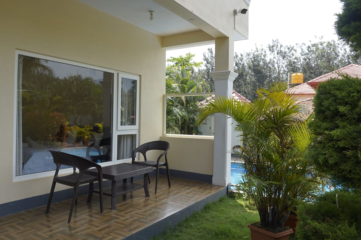 Deluxe Room, Balcony, Pool View | Balcony