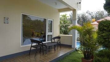 Deluxe Room, Balcony, Pool View | Balcony