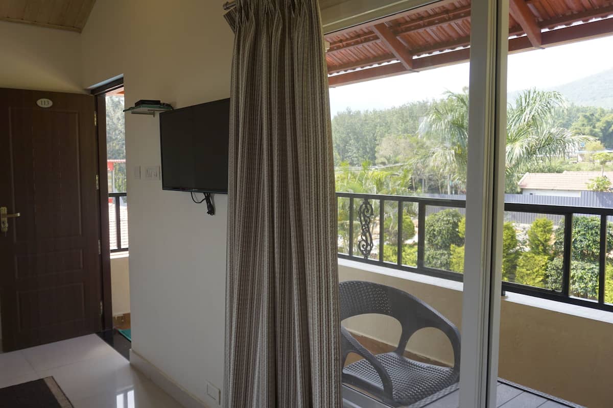 Deluxe Triple Room, Balcony, Pool View | Balcony