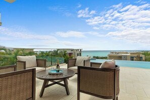 Outdoor dining - Luxury villa  in the exclusive Whitehouse Beach Club community, Jamaica (New Hope)