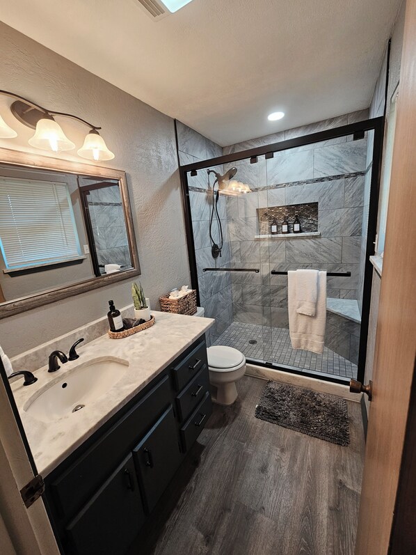 Shower, hair dryer, towels, soap