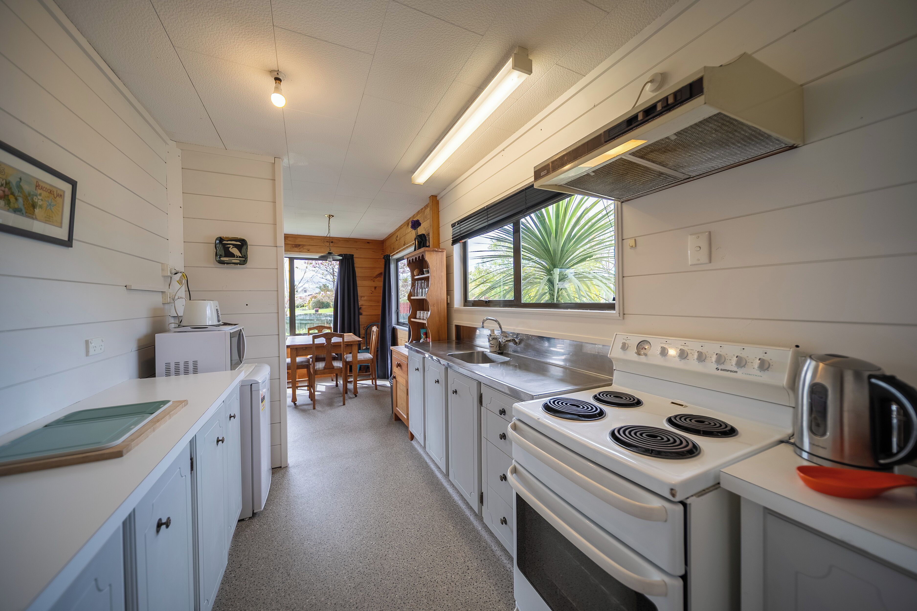 Fridge, microwave, toaster, cookware/dishes/utensils