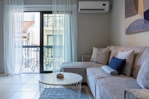 Lägenhet - 1 sovrum - kök - utsikt mot staden | Vardagsrum | Platt-tv