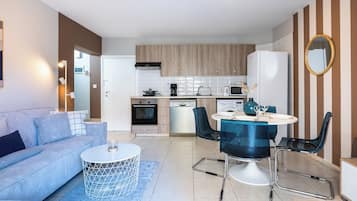 Lejlighed - 1 soveværelse - køkken - byudsigt | Stue | Fladskærms-tv