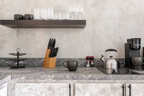 Fridge, microwave, stovetop, coffee/tea maker
