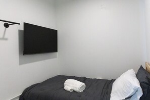 1 habitación, tabla de planchar con plancha, wifi y ropa de cama 