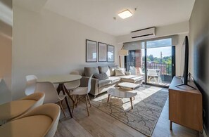 Loft Deluxe, balcón | Área de sala de estar