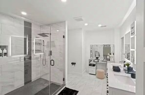 Shower, hair dryer, towels, soap