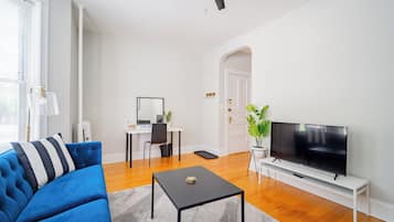 Exclusive Apartment, 2 Bedrooms | Living area | 55-inch TV with digital channels, streaming services