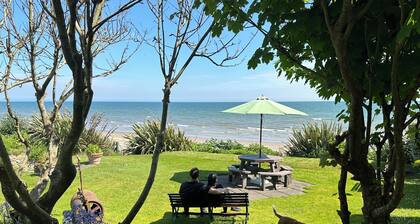 Rose Cottage ~ 5 Star luxury thatched cottage on miles of sandy beach