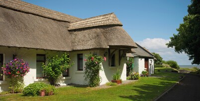 Rose Cottage ~ 5 Star luxury thatched cottage on miles of sandy beach