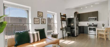 Superior Apartment, 1 Bedroom | Living area | 55-inch TV with digital channels, streaming services