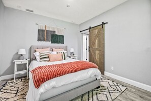 1 bedroom, desk, iron/ironing board, travel crib