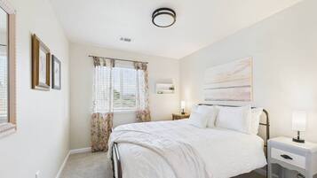 3 bedrooms, desk, iron/ironing board, travel cot