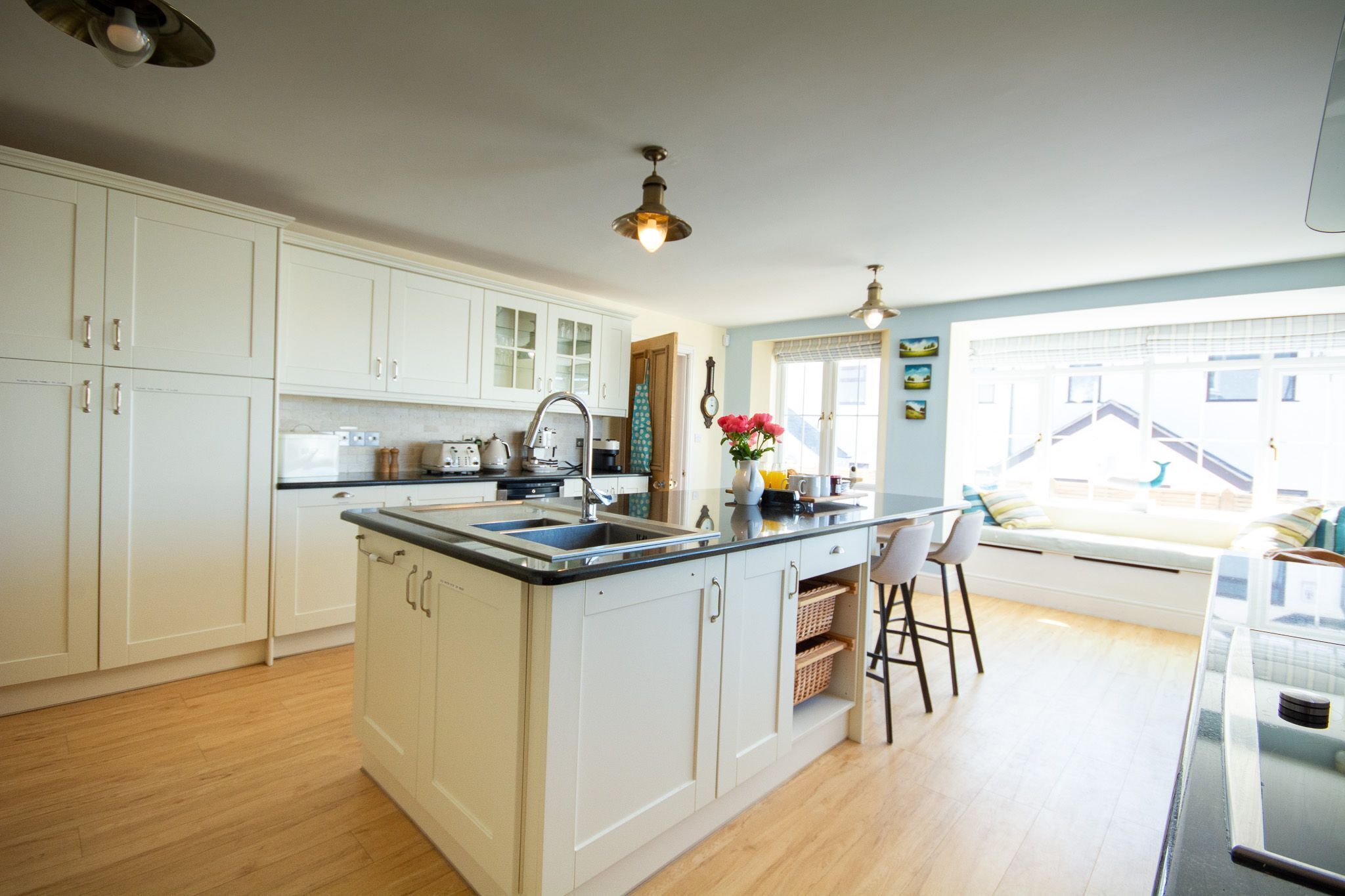 Fridge, microwave, toaster, dining tables