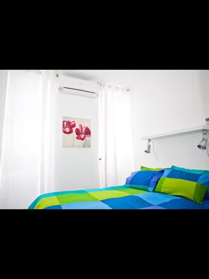 2 habitaciones, tabla de planchar con plancha, wifi y ropa de cama 