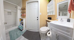 Shower, towels, soap, toilet paper