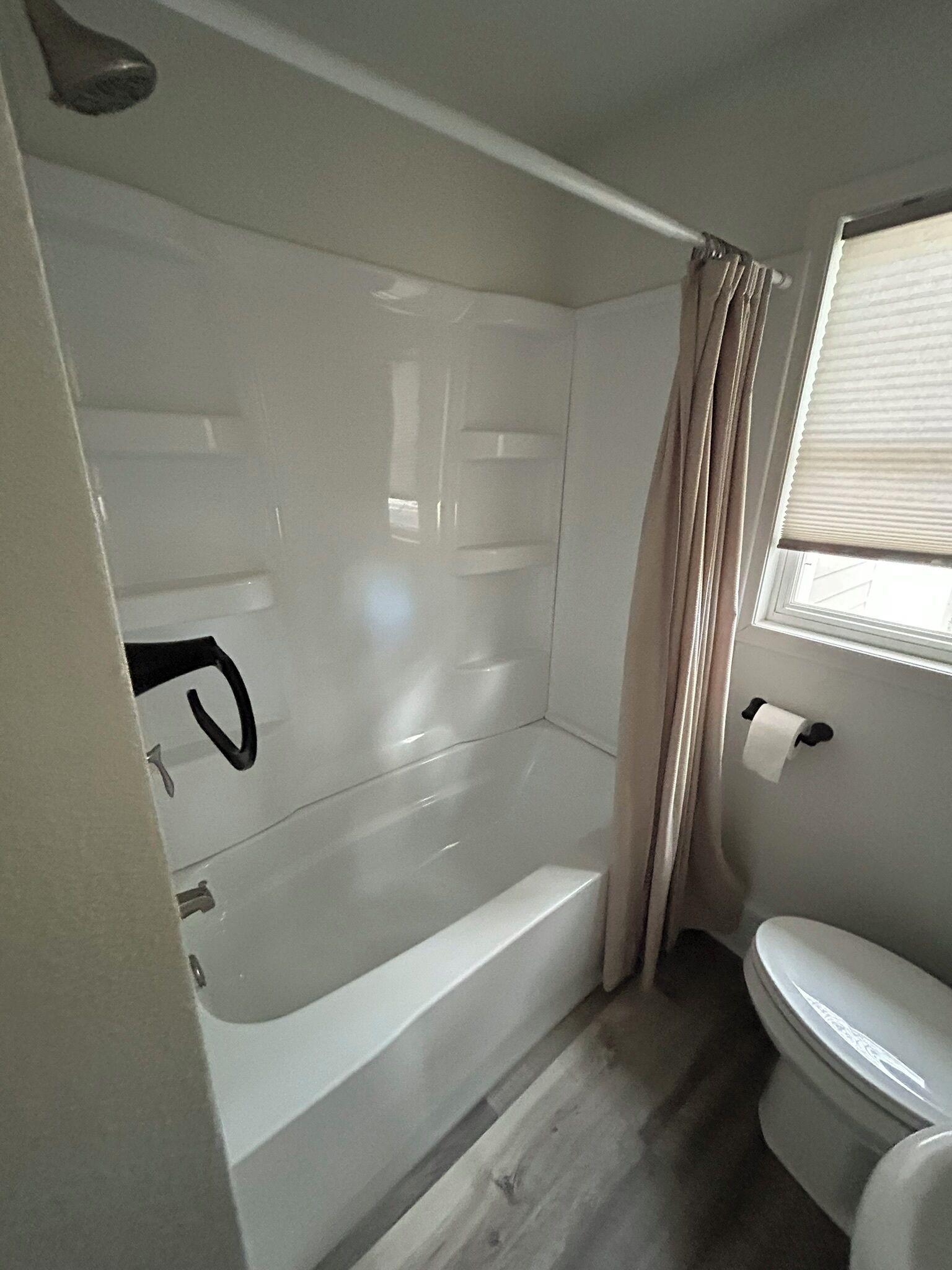 Shower, towels, toilet paper