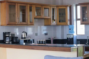 Microwave, oven, stovetop - Charming 2-bedroom bungalow in Kilifi County with AC (Kilifi County)