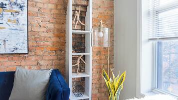 Classic Apartment, 1 Queen Bed | Living area | 55-inch TV with digital channels, streaming services