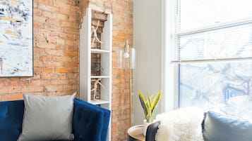 Classic Apartment, 1 Queen Bed | Living area | 55-inch TV with digital channels, streaming services