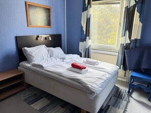 Apartamento clásico, vistas a la ciudad | Cortinas opacas y sistema de insonorización