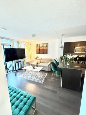 Condo, 1 chambre | Aire de séjour