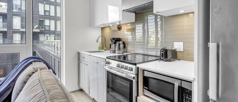 Appartement Signature, vue ville | Cuisine privée