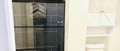 Shower, towels, soap, shampoo