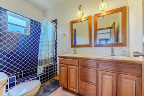 Shower, towels, soap, toilet paper