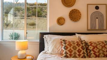 Desk, travel crib, free WiFi, bed sheets