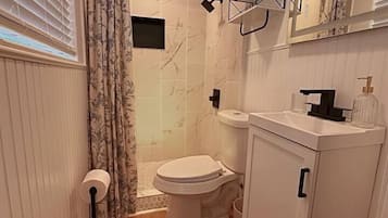 Regadera y secadora de cabello