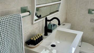Hair dryer, towels, soap, shampoo