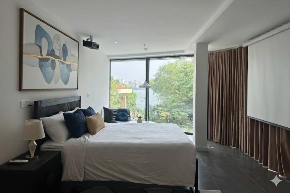 ห้องดีลักซ์ดับเบิล, วิวทะเลสาบ | โต๊ะทำงาน, Wi-Fi ฟรี, ผ้าปูที่นอน