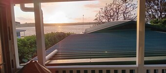 Cosy retreat at Port Waikato with amazing sunsets and river views