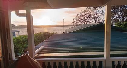 Cosy retreat at Port Waikato with amazing sunsets and river views