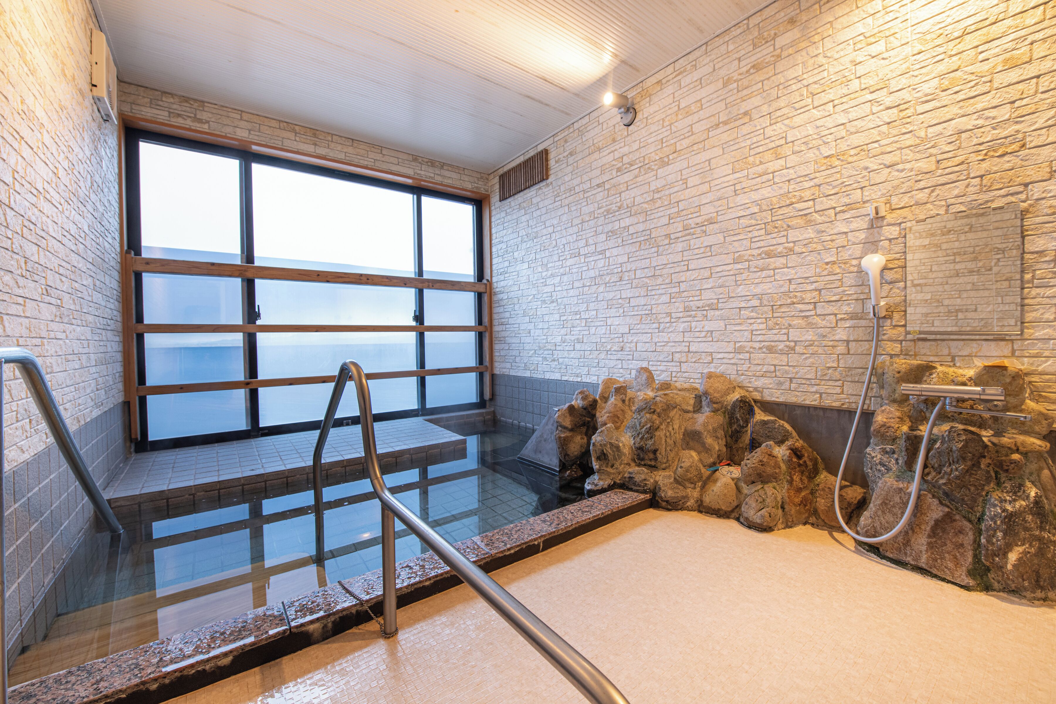 Desk, laptop workspace, bed sheets