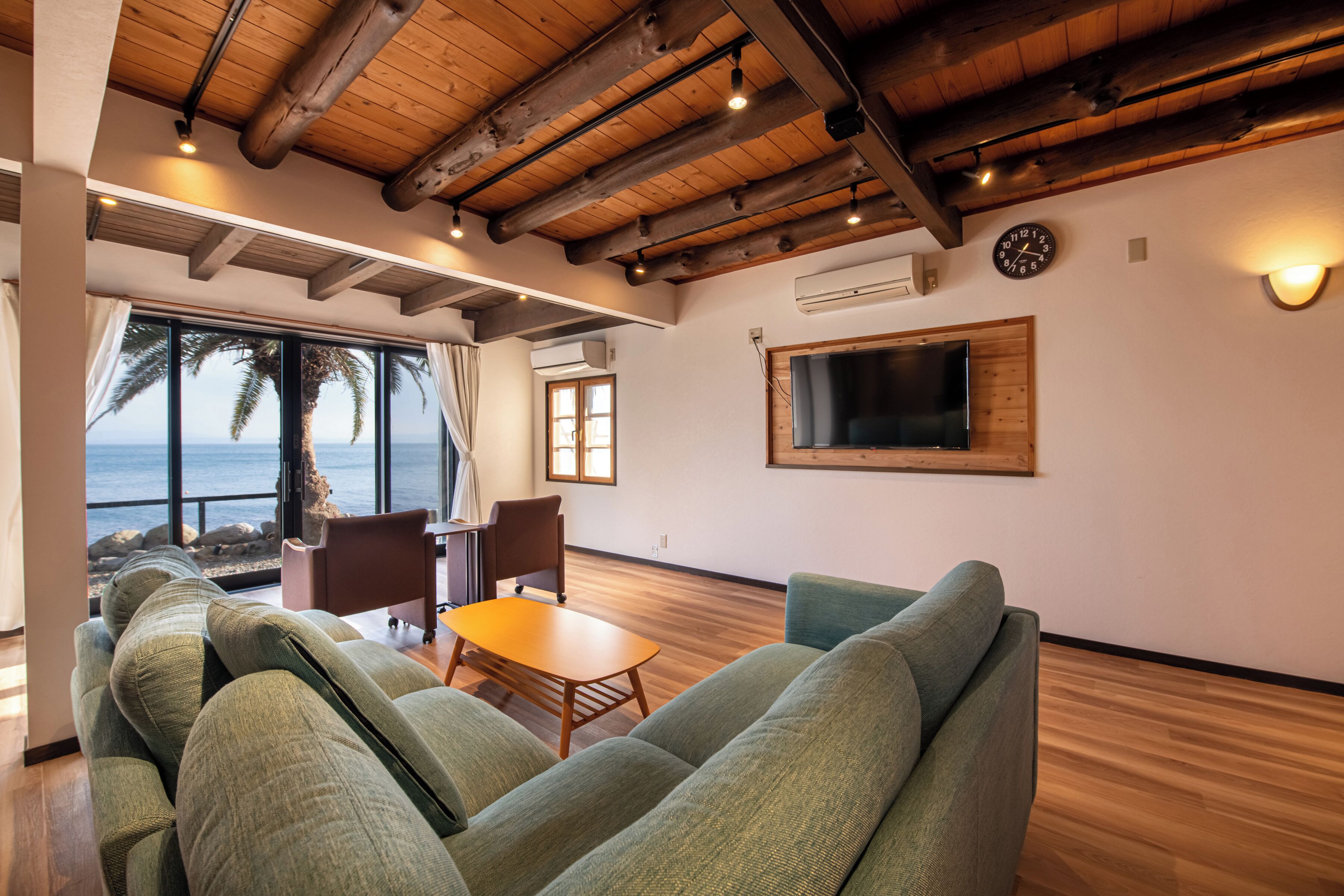 Cottage, Balcony, Ocean View | Desk, laptop workspace, bed sheets