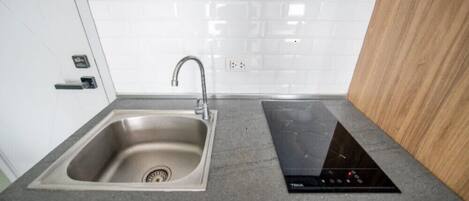 Apartment, Balcony, Hill View | Private kitchenette | Full-size fridge, microwave, stovetop, cookware/dishes/utensils