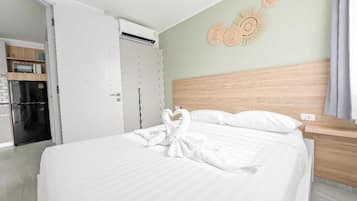 Apartment, Balcony, Hill View | In-room safe, blackout drapes, iron/ironing board, free WiFi