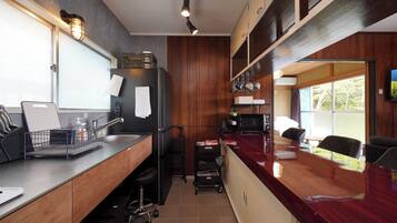 Fridge, microwave, stovetop, cookware/dishes/utensils