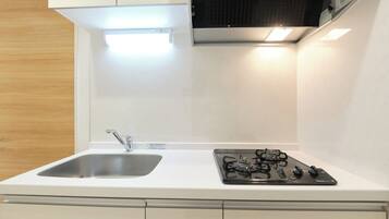 Fridge, microwave, stovetop, cookware/dishes/utensils