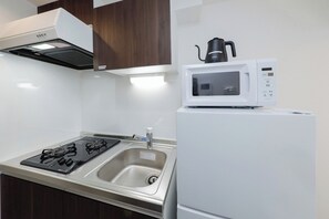 Fridge, microwave, stovetop, cookware/dishes/utensils