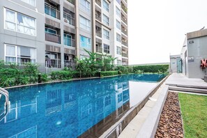 Departamento, 2 habitaciones, con acceso para personas discapacitadas, para fumadores | Alberca | Alberca al aire libre 