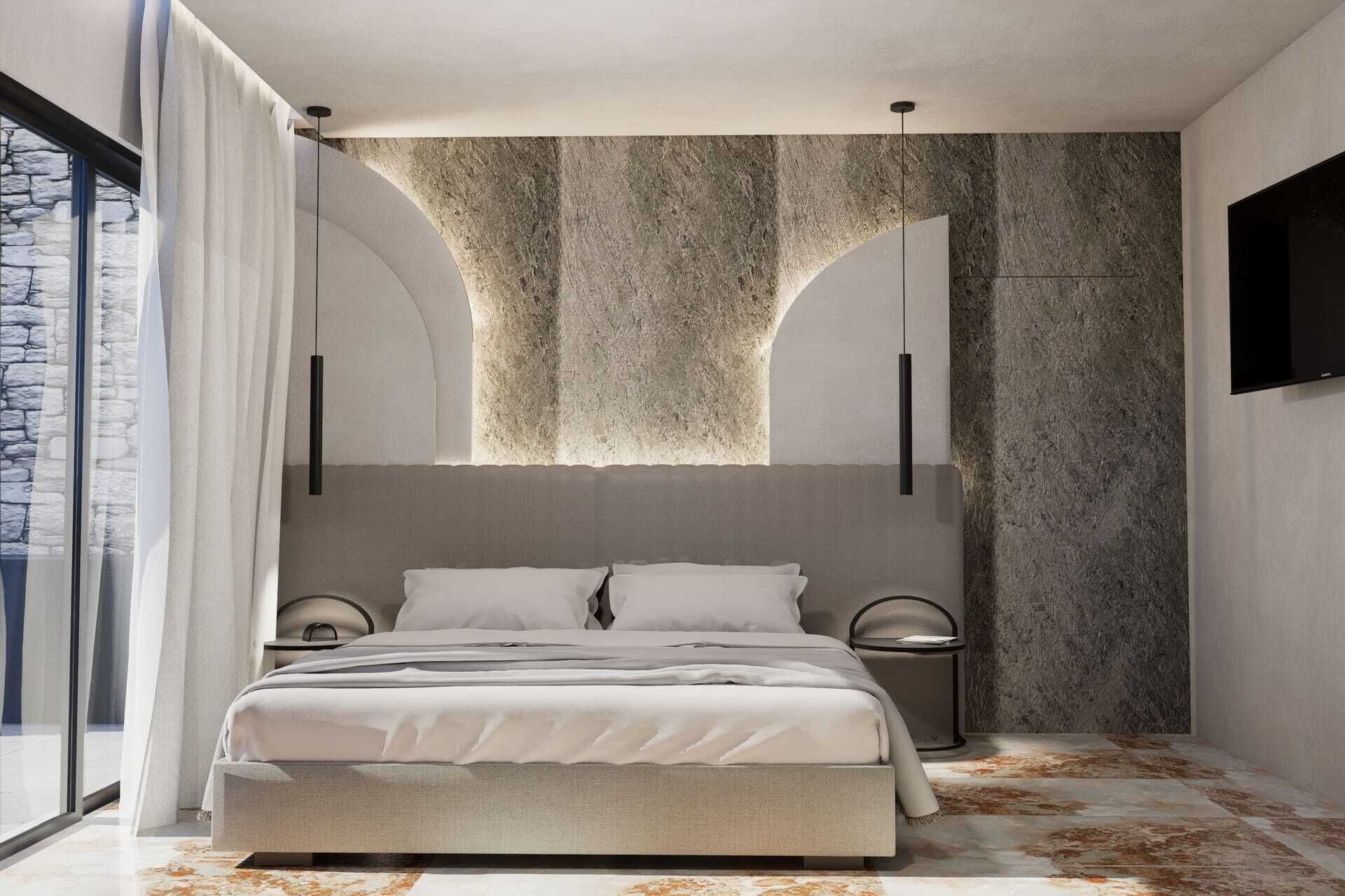 Un dormitori modern amb un llit gran, una paret decorativa de pedra i una vista per la finestra.