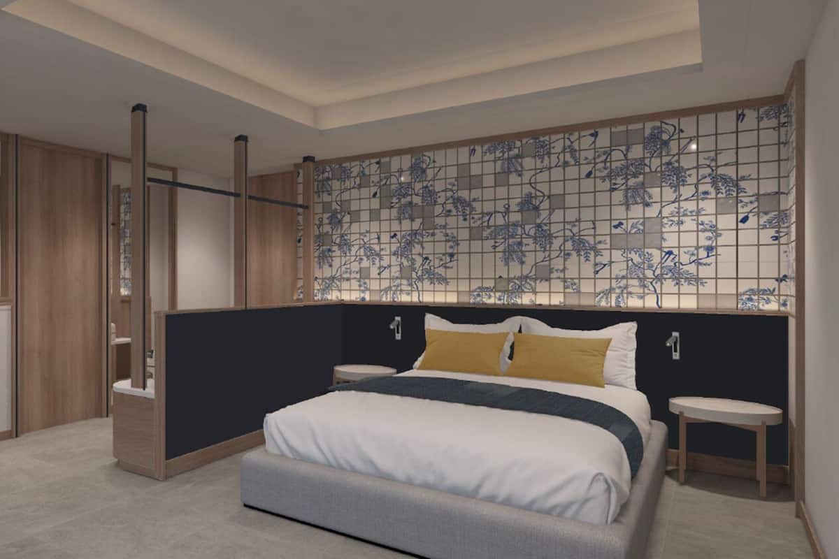 Habitación Deluxe, 1 cama King size | Caja de seguridad en la habitación y tabla de planchar con plancha