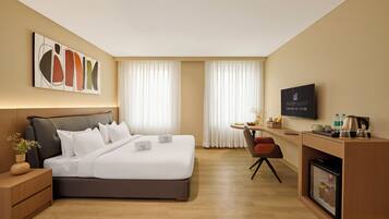 Ropa de cama de alta calidad y minibar