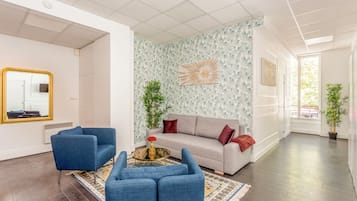 Apartment, City View | Living area | 43-inch Smart TV with cable channels, Netflix, streaming services