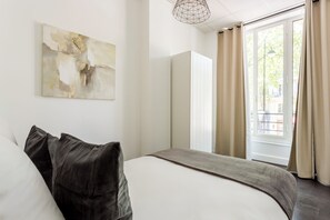 Apartment, City View | Hypo-allergenic bedding, pillow-top beds, in-room safe - Merveil Family Suite - Sebastopol III (Paris)